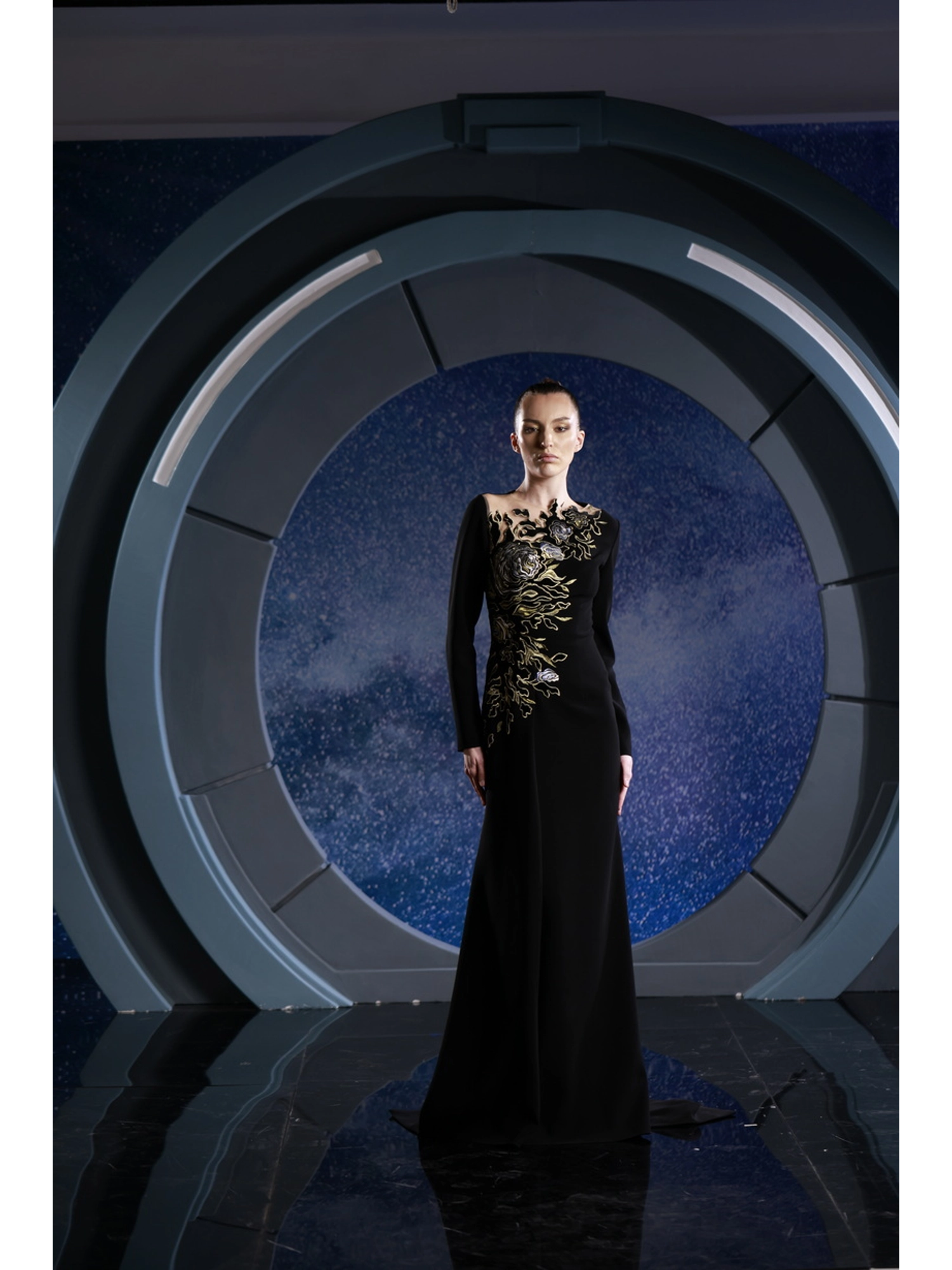 FW 112 - Black crepe dress adorned with shimmering gold sequins. Black US 01