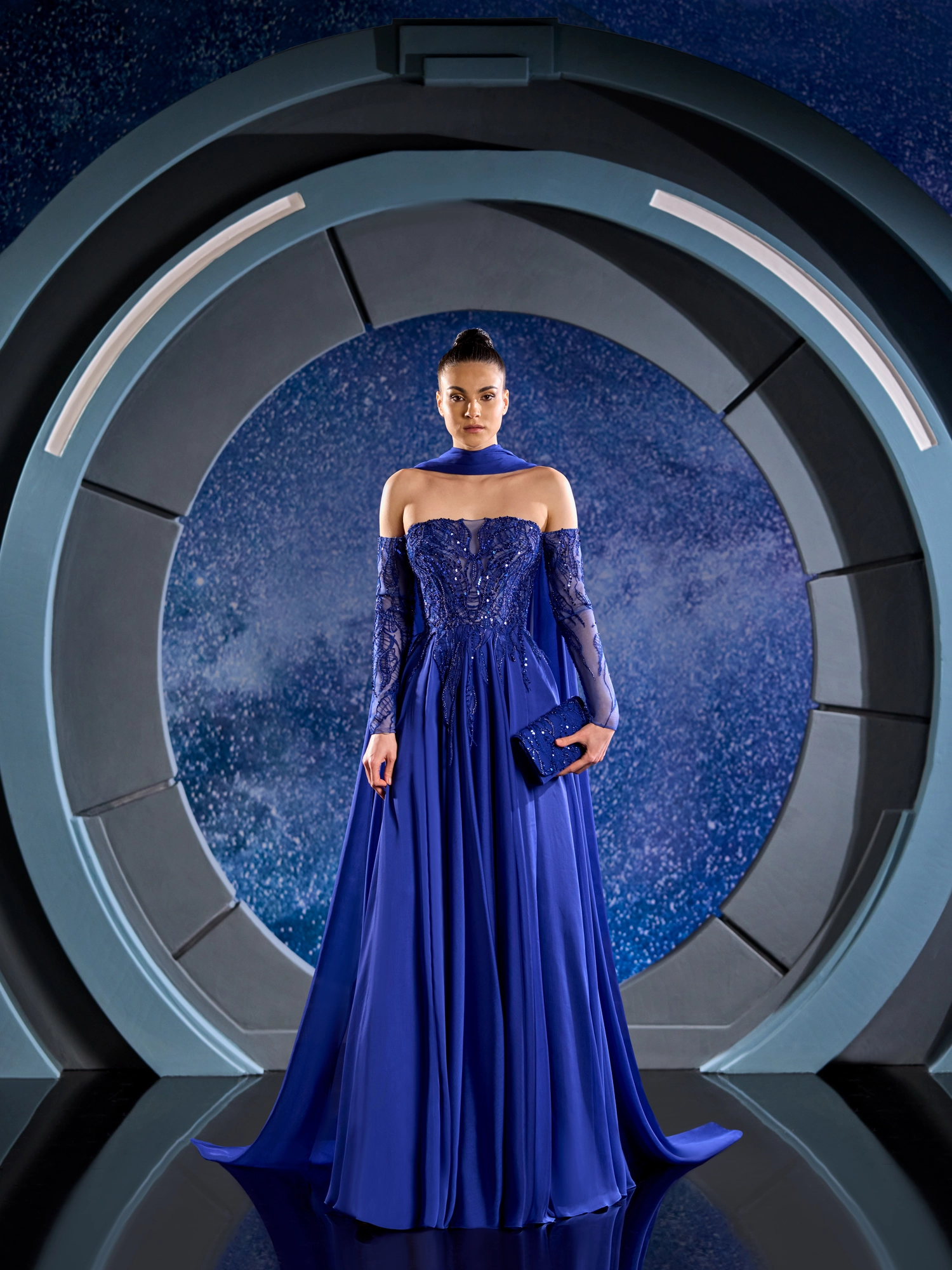 FW 120 - Royal blue dress, featuring a flowing mousseline skirt that  exudes grace.Royal Blue US 01